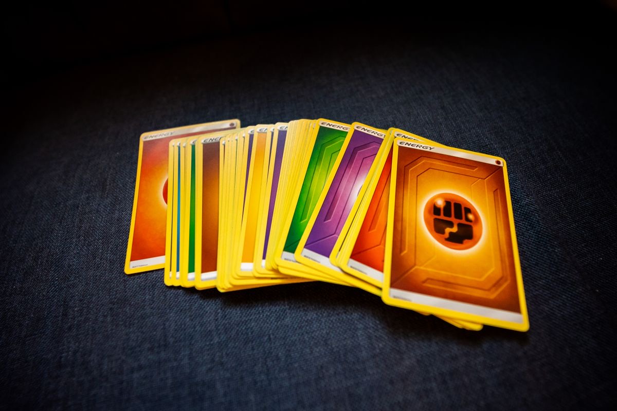 A fanned-out stack of colorful trading cards